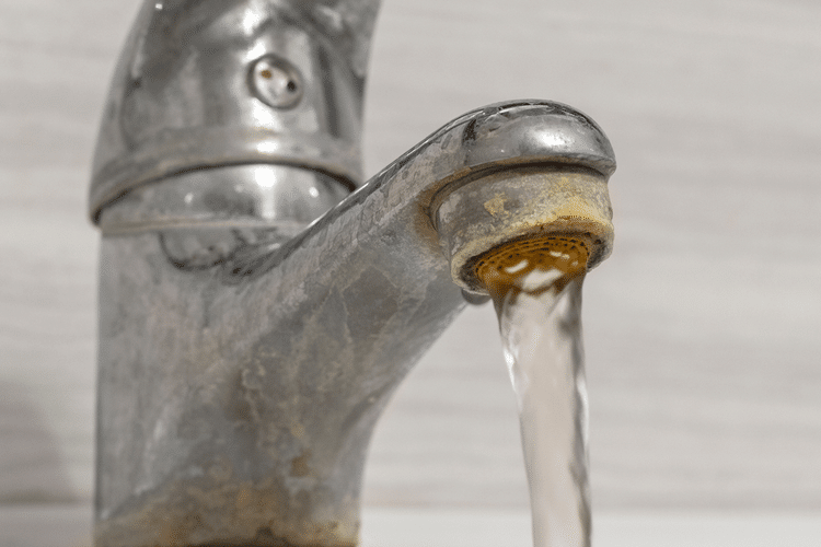 Hard Water Deposits on Tap Faucet
