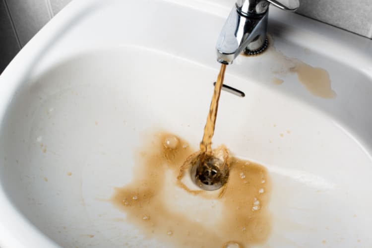 5 Causes of Brown Water & How to Get Rid Of It