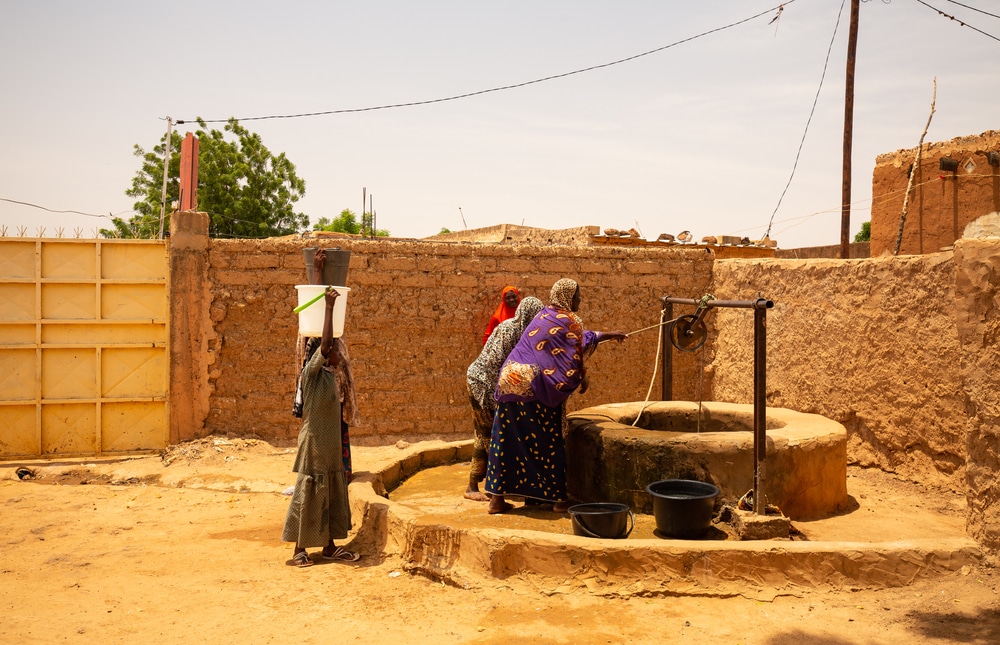 Women Taking Water from Well in Niger